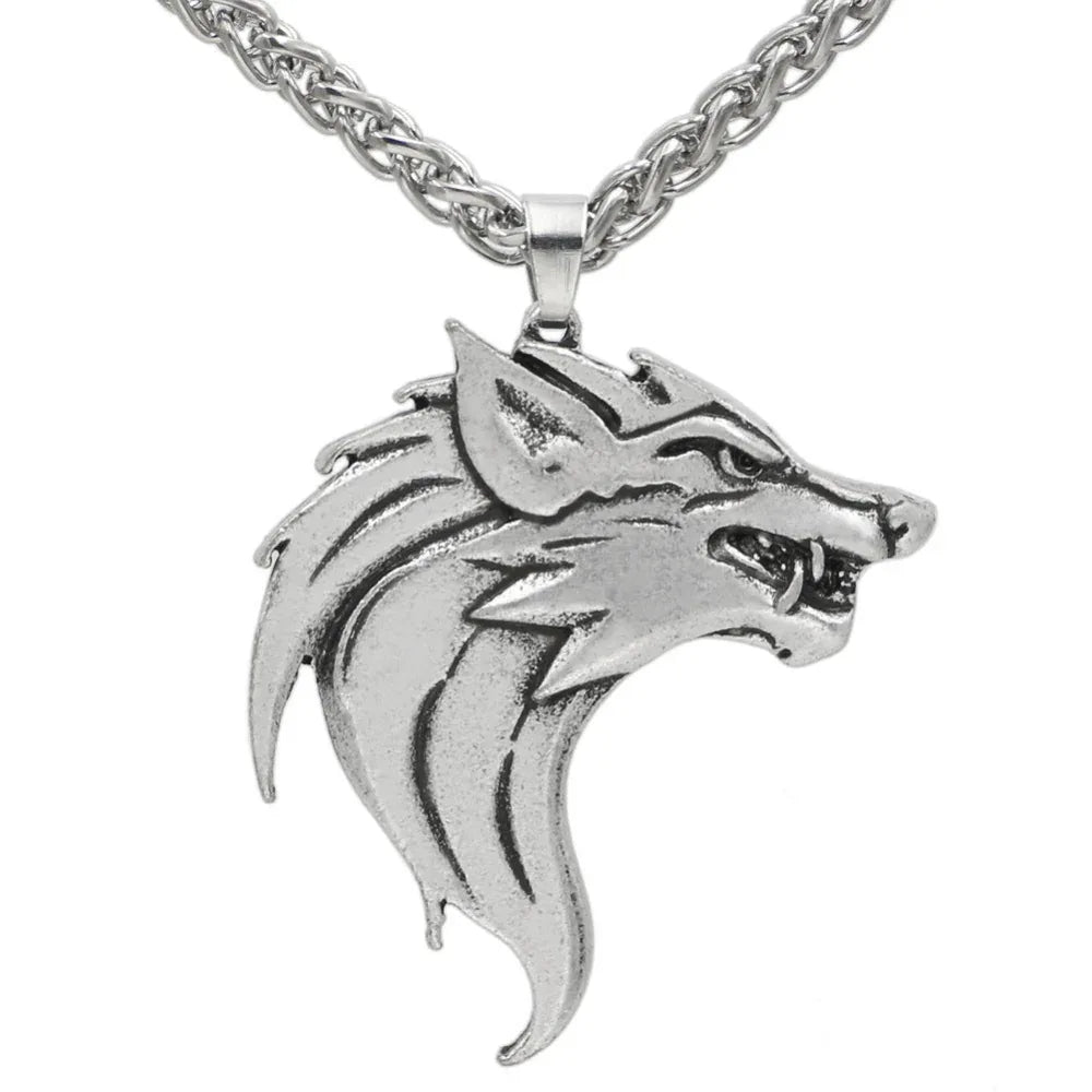 Herrhalsband med varghuvud‑hänge